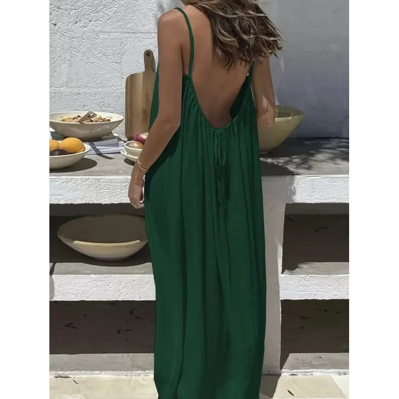 Long, loose-fitting house dress without straps or back, comfortable for sleeping