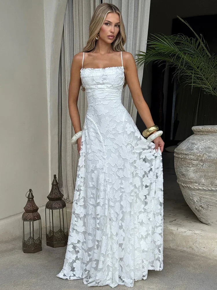 Women's long evening dress with an open back and thin straps,