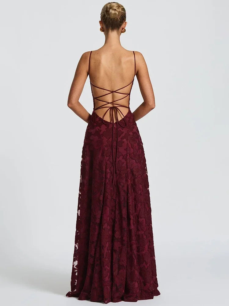 Women's long evening dress with an open back and thin straps,