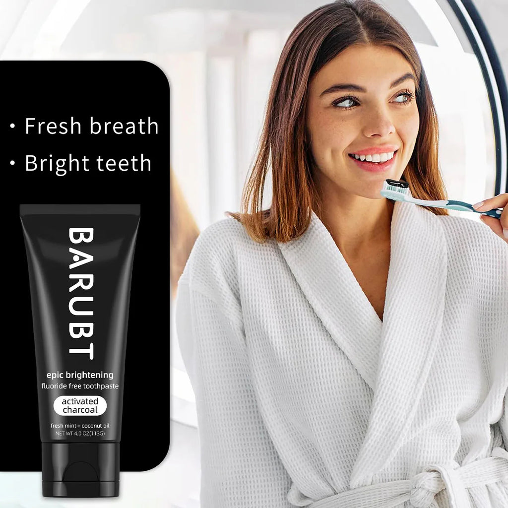 Whitening toothpaste with activated charcoal and mint removes teeth stains.