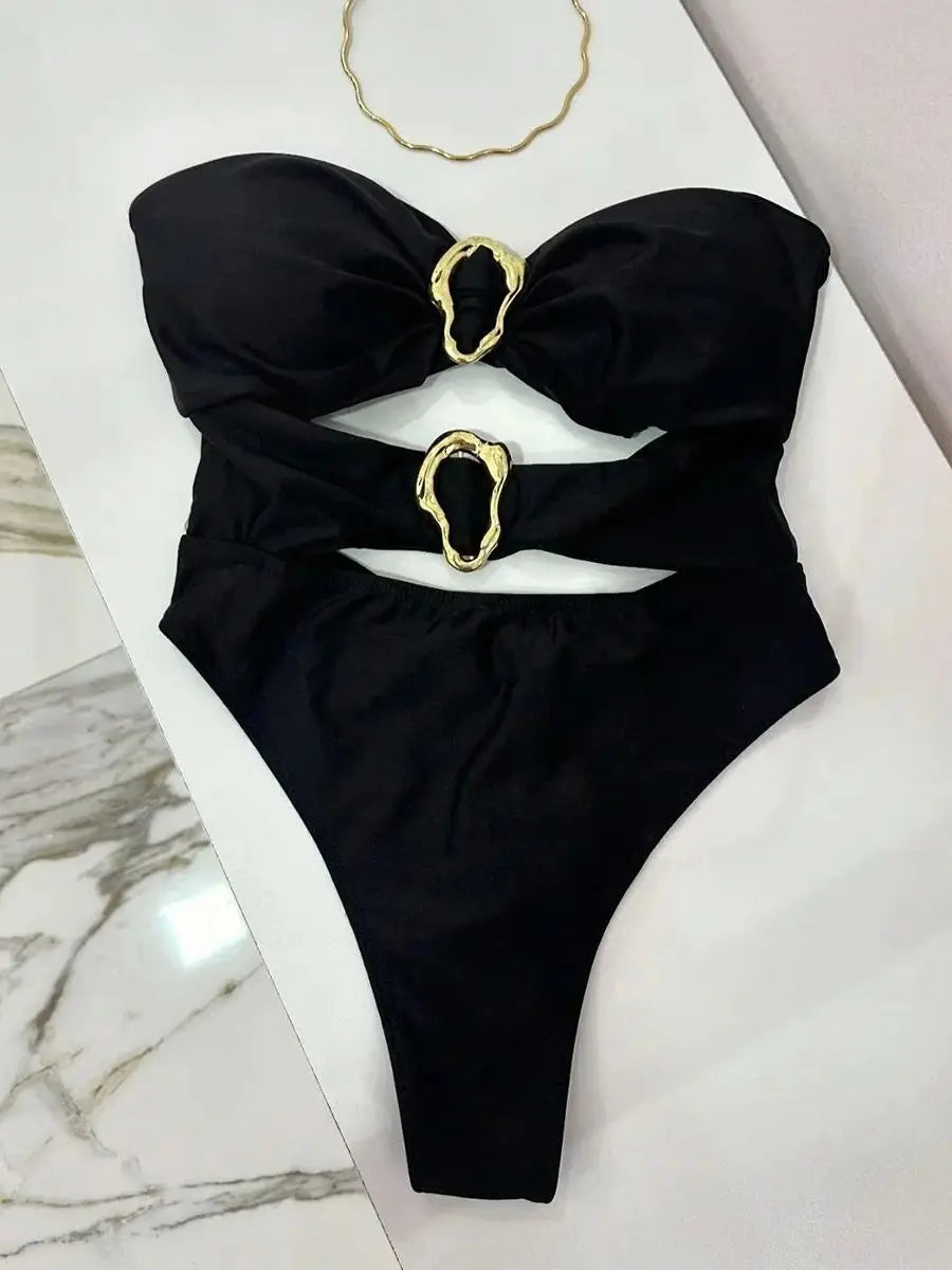 Sexy women's swimsuit in three colors, with an attractive metal ring design.
