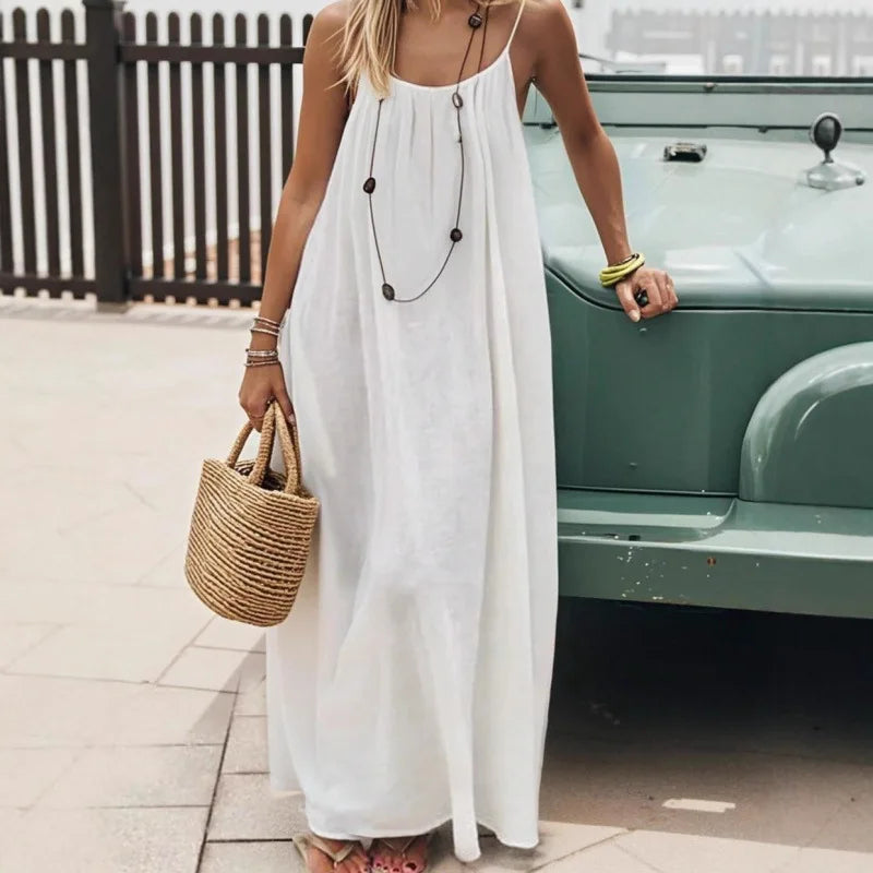 Long, loose-fitting house dress without straps or back, comfortable for sleeping
