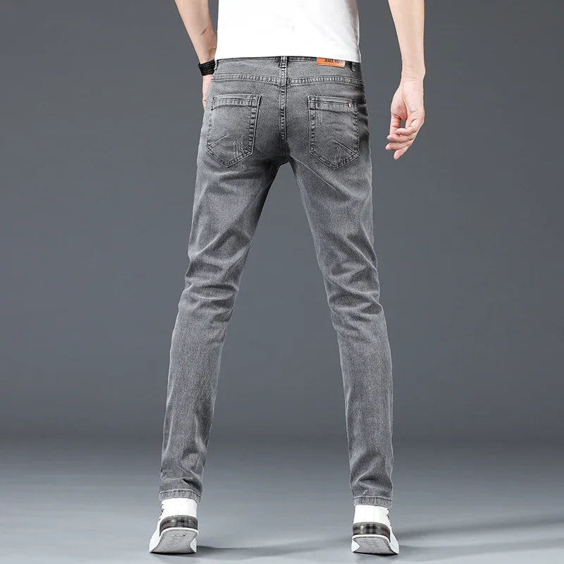 New men's slim-fit cotton jeans,

بنطلون جينز رجالي جديد مصنوع من القطن بقصة ضيقة،