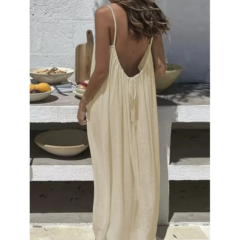 Long, loose-fitting house dress without straps or back, comfortable for sleeping