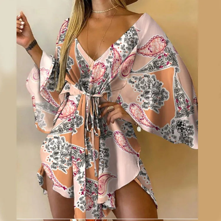 Sexy printed women's dress with a V-neck, wide sleeves, ruffles, and a loose, short floral print, perfect for summer vacations.