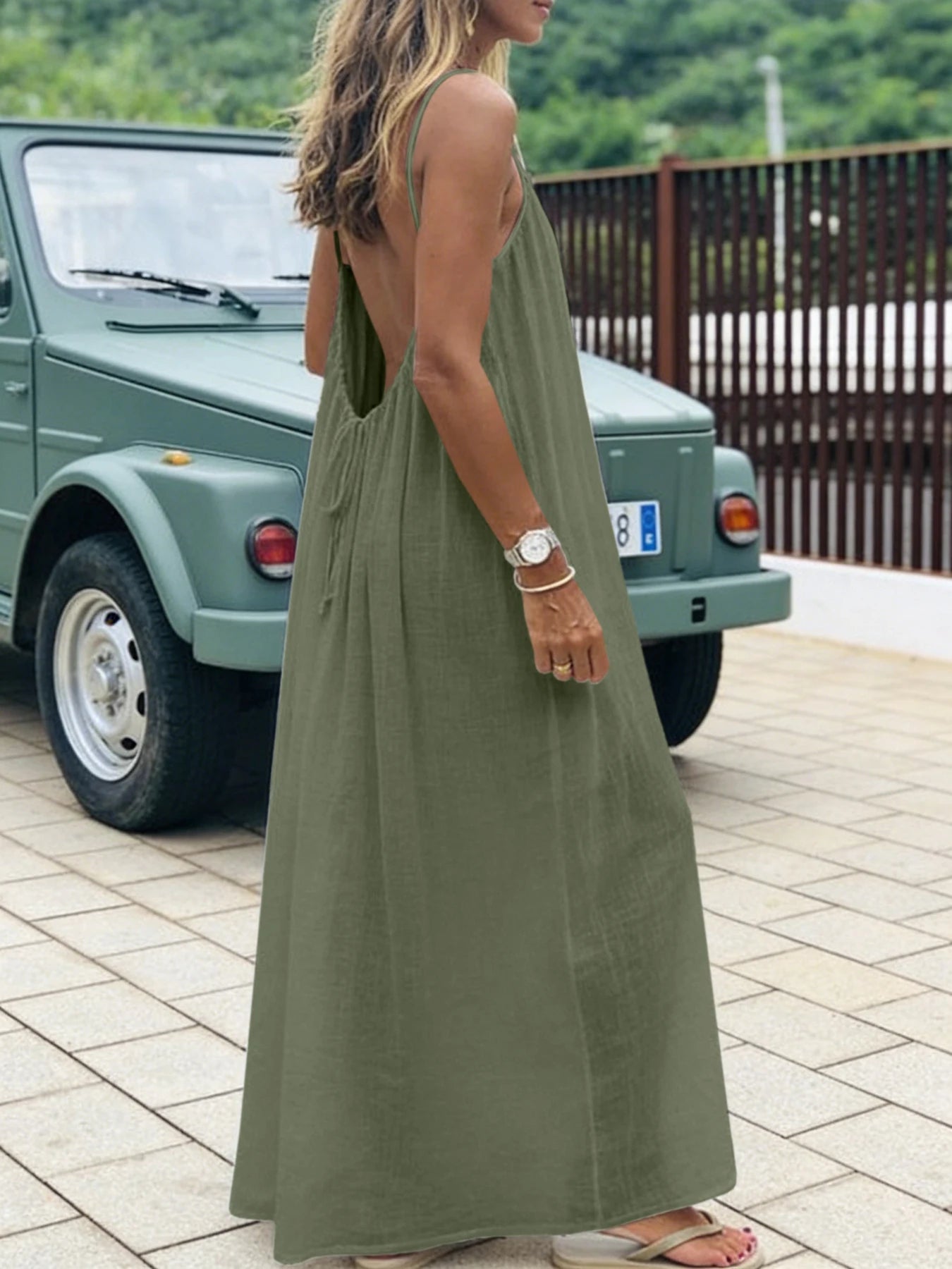 Long, loose-fitting house dress without straps or back, comfortable for sleeping