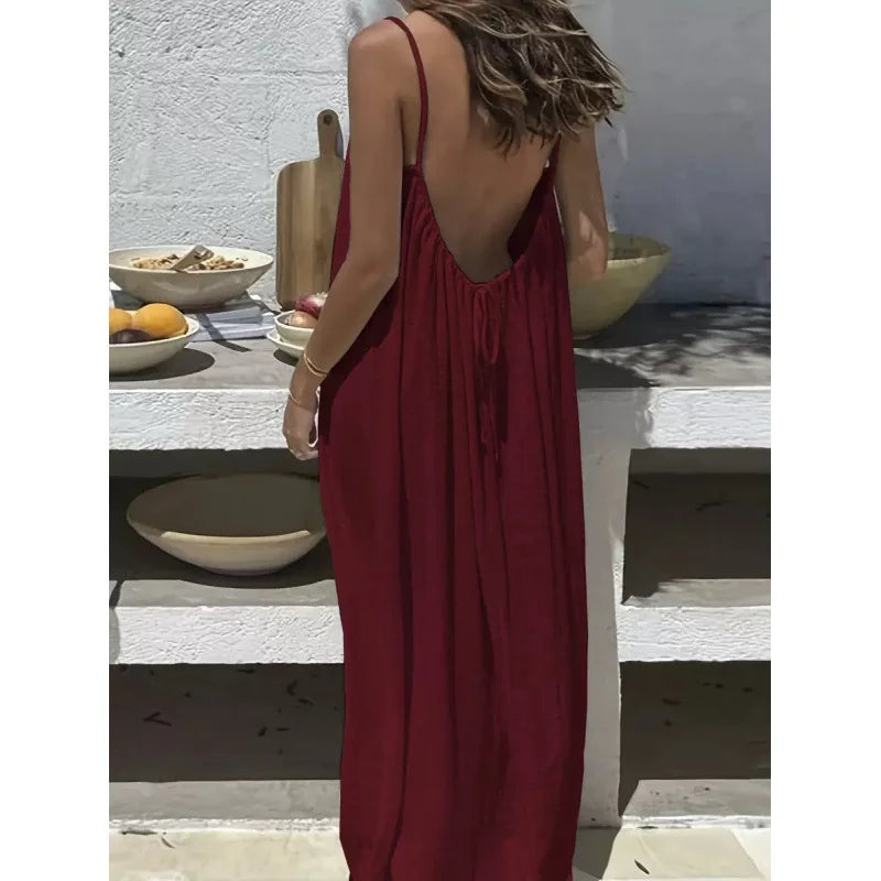 Long, loose-fitting house dress without straps or back, comfortable for sleeping