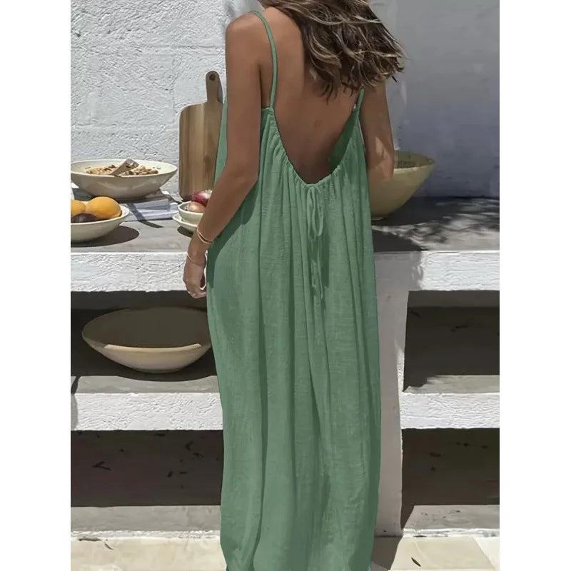 Long, loose-fitting house dress without straps or back, comfortable for sleeping