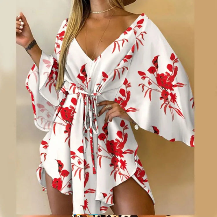 Sexy printed women's dress with a V-neck, wide sleeves, ruffles, and a loose, short floral print, perfect for summer vacations.
