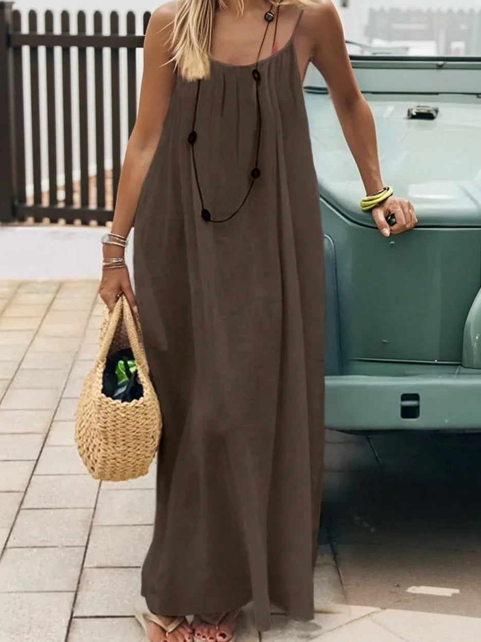 Long, loose-fitting house dress without straps or back, comfortable for sleeping