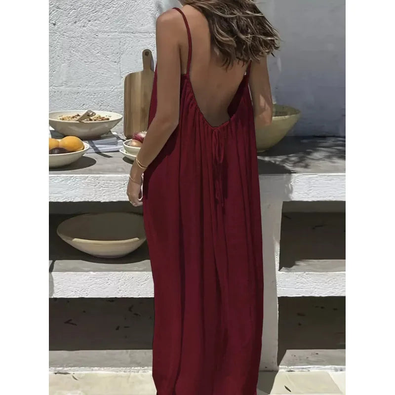 Long, loose-fitting house dress without straps or back, comfortable for sleeping