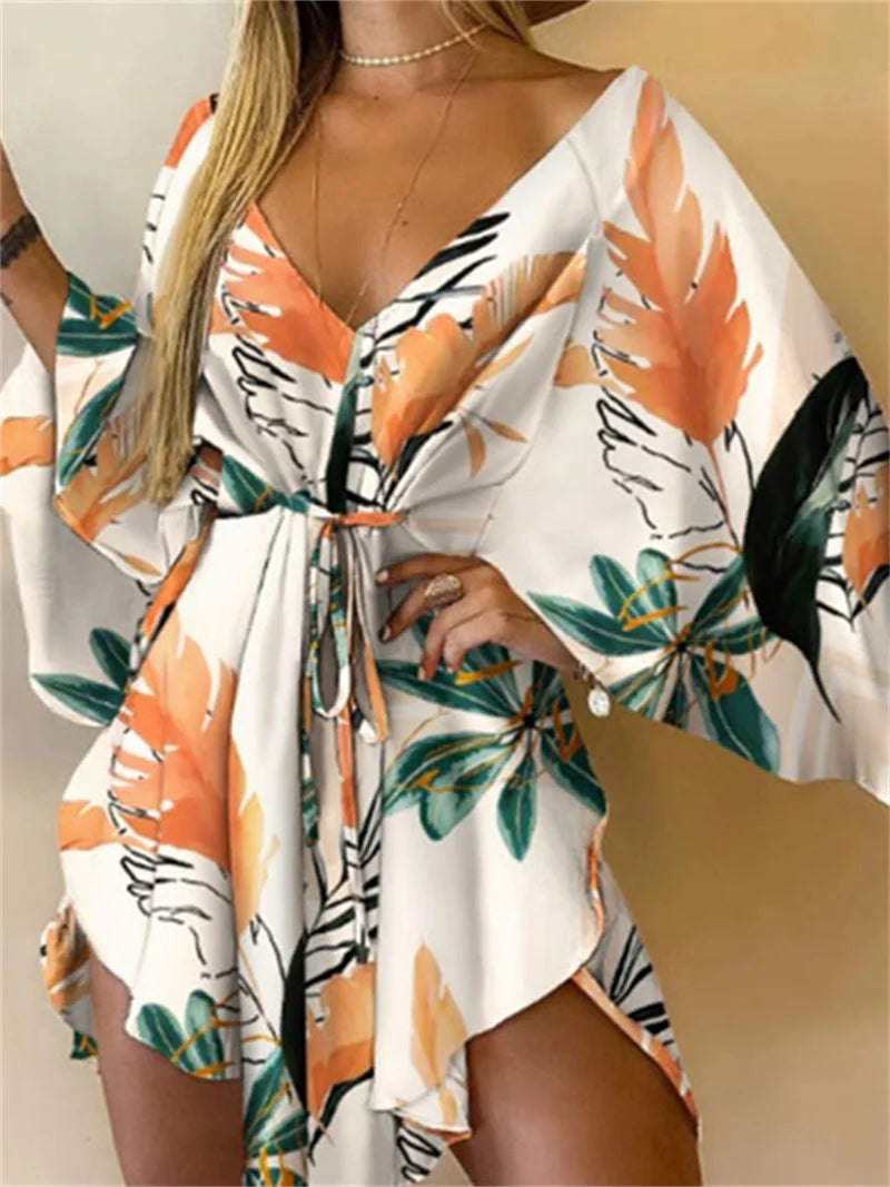 Sexy printed women's dress with a V-neck, wide sleeves, ruffles, and a loose, short floral print, perfect for summer vacations.