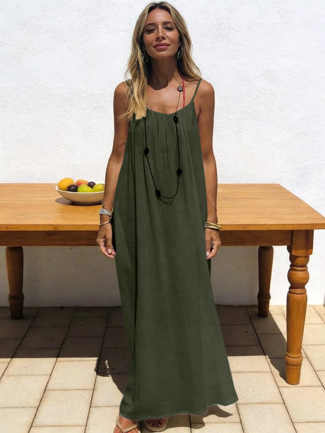 Long, loose-fitting house dress without straps or back, comfortable for sleeping