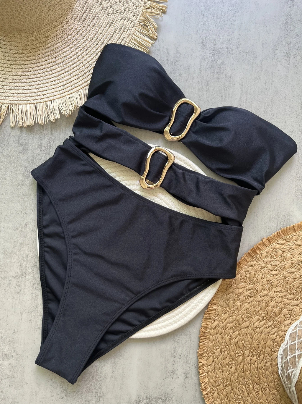 Sexy women's swimsuit in three colors, with an attractive metal ring design.