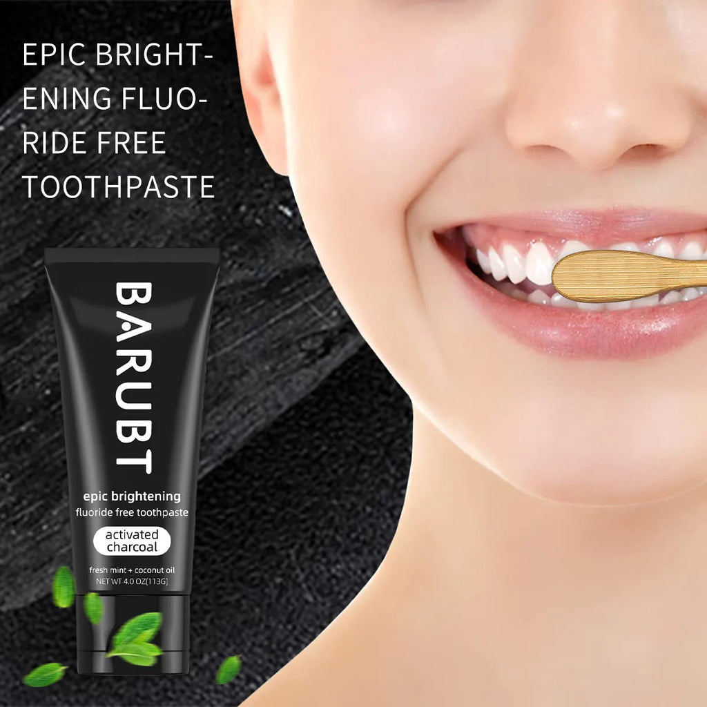 Whitening toothpaste with activated charcoal and mint removes teeth stains.