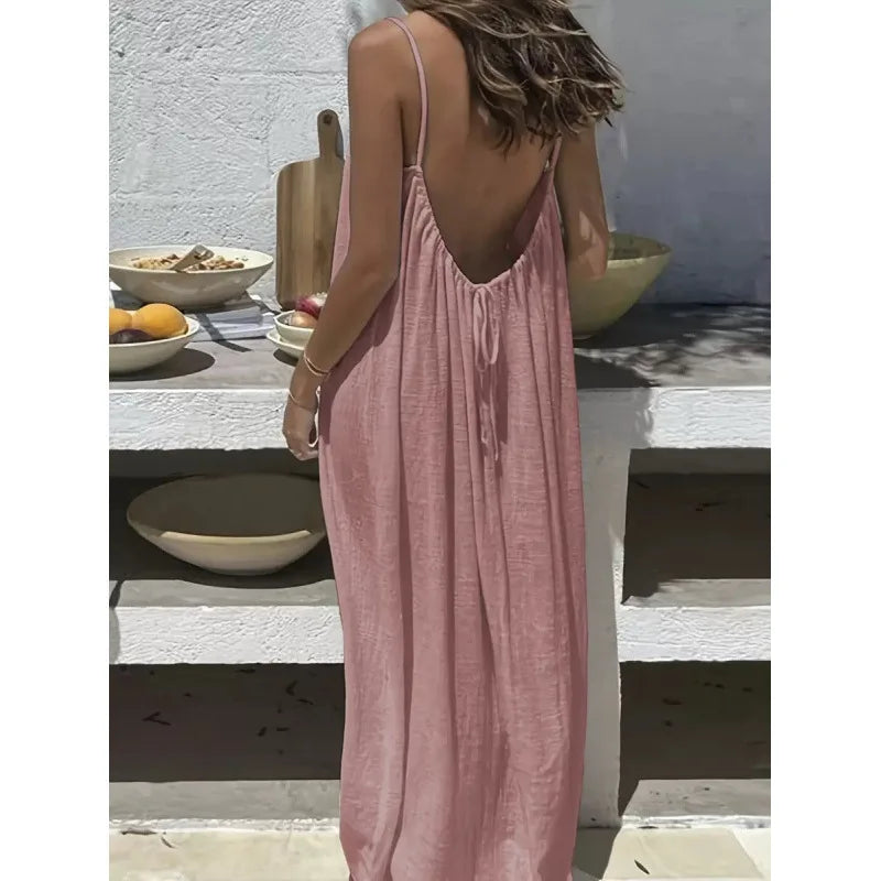 Long, loose-fitting house dress without straps or back, comfortable for sleeping