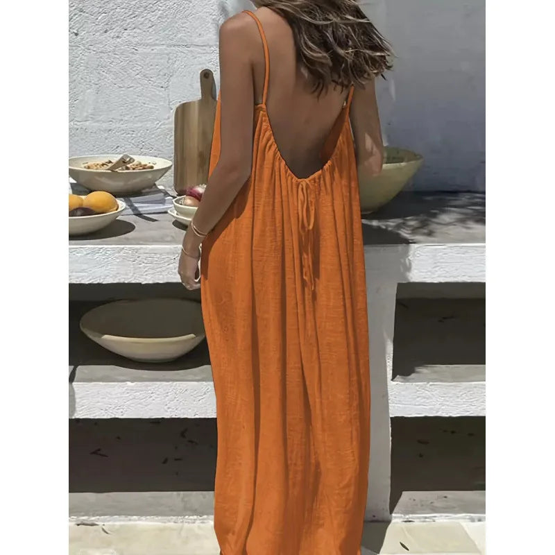Long, loose-fitting house dress without straps or back, comfortable for sleeping