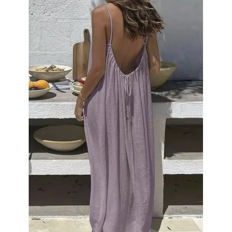 Long, loose-fitting house dress without straps or back, comfortable for sleeping