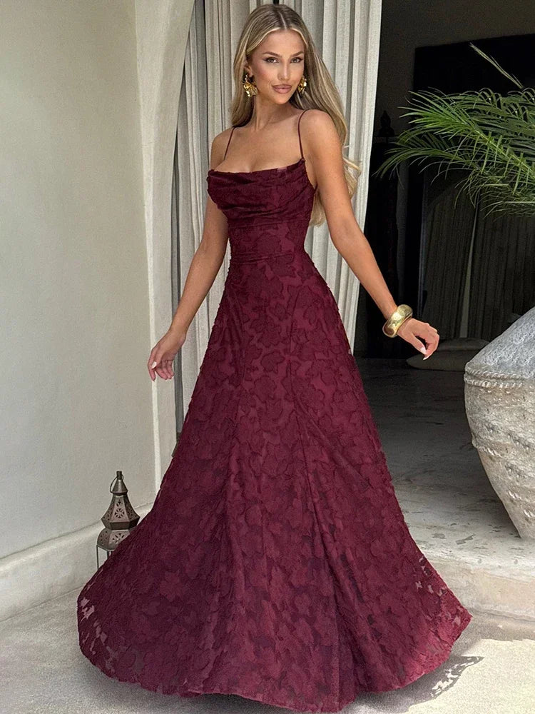 Women's long evening dress with an open back and thin straps,